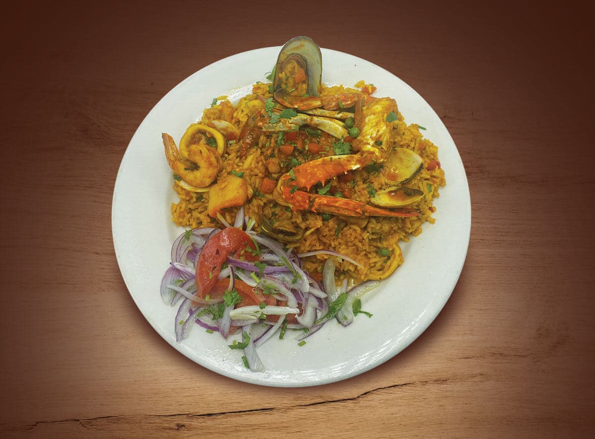 How we serve the Arroz Con Mariscos at our restaurant